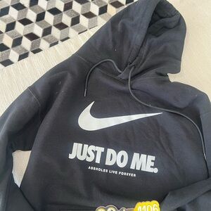Black Hoodie with Bold Slogan